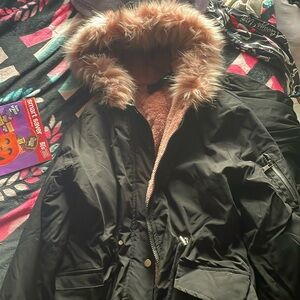 Woman’s Black winter coat size xL, very soft, fuzzy material
